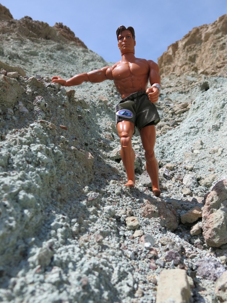 Doug hikes on weird blue dirt in Death Valley.