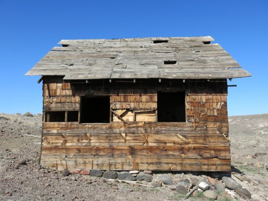 Rock foundation and cedar shakes