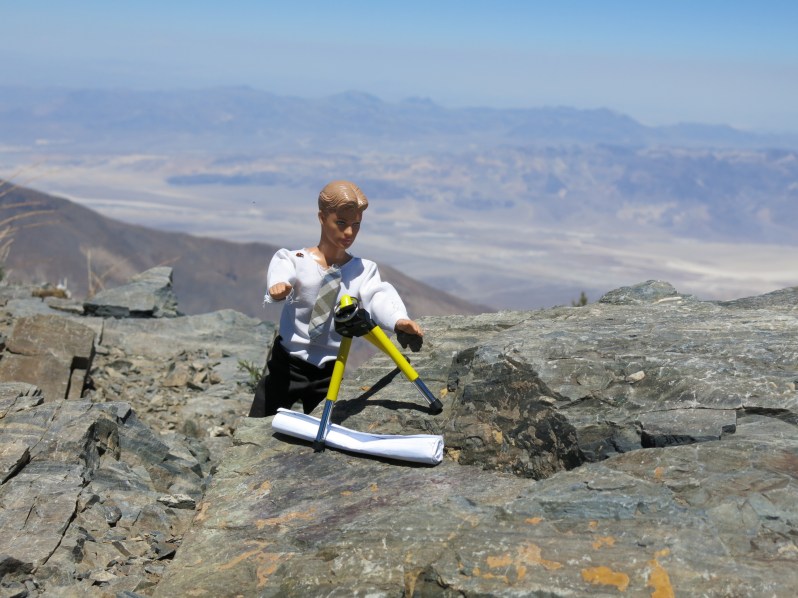 "Hee hee hee," giggles Pretty Boy as he sets up his survey equipment. It's hard to see clearly with all those dollar signs in his eyes.
