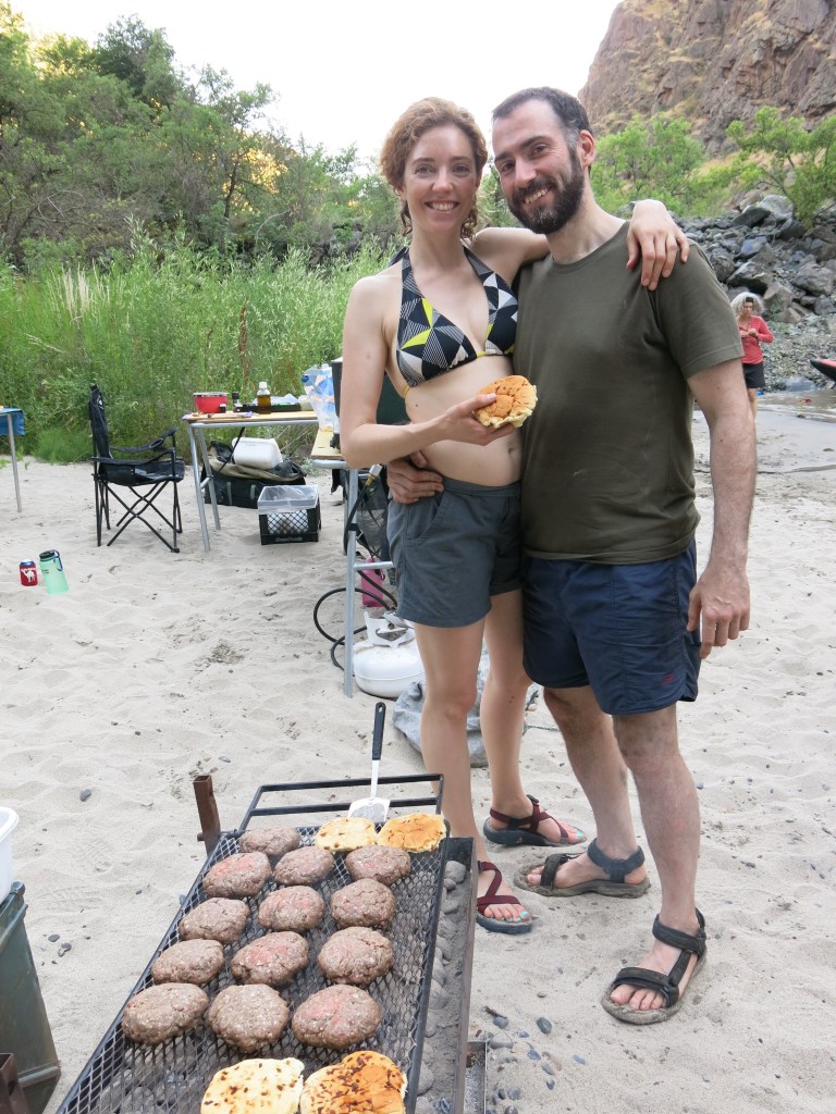 Noelle and Lawrence serve up burgers and smiles.